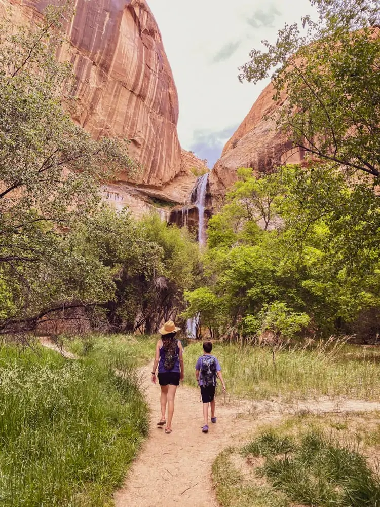 Sharing tips for hiking Lower Calf Creek Falls including how long it takes to hike, swimming calf creek falls and more! 