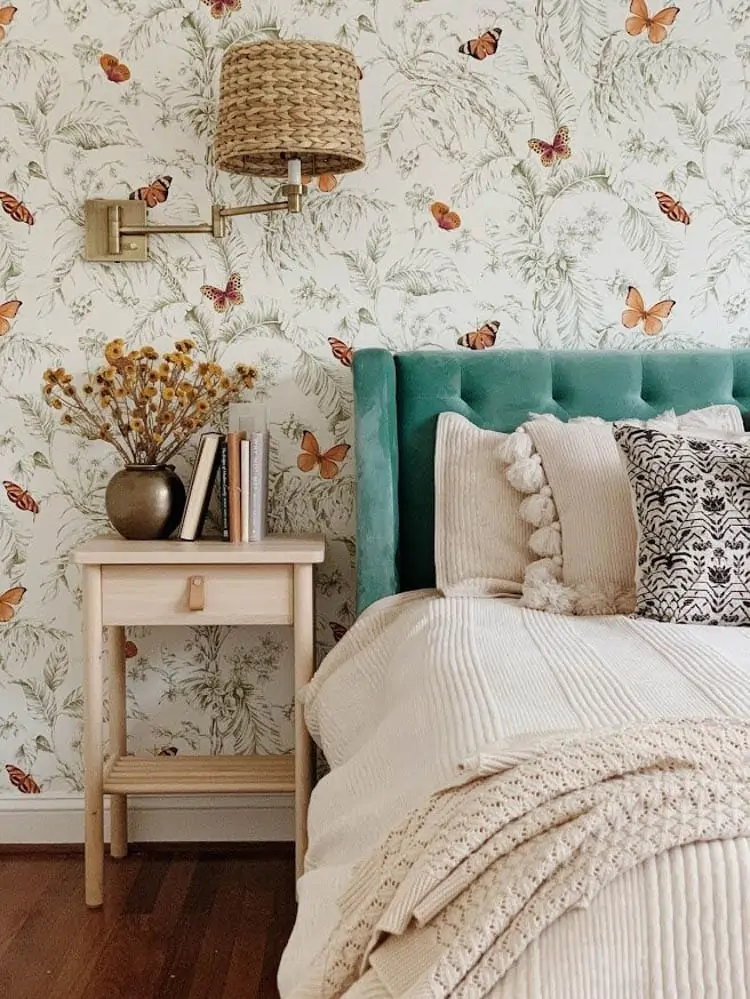 Butterfly wallpaper in bedroom. Bedroom designed by StyleMutt Home. 