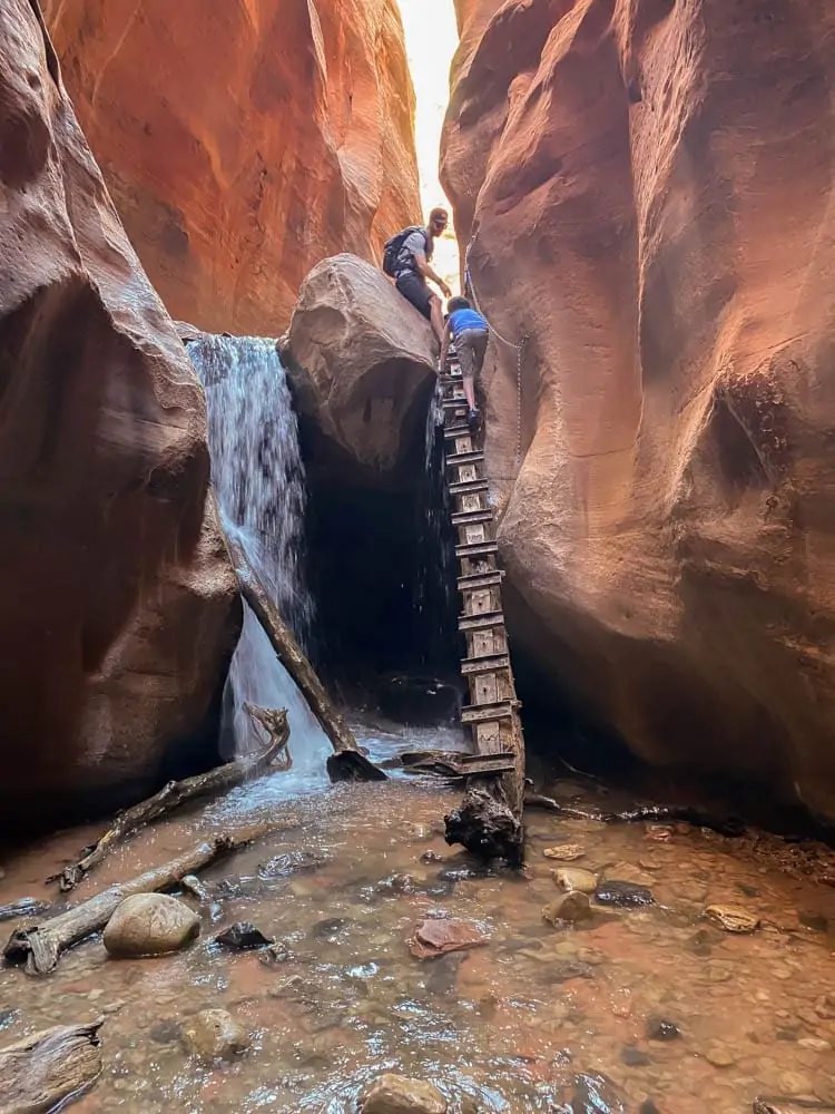 Kanarraville Falls Utah Slot Canyon Trail - hiking the ladder at Kanarra falls