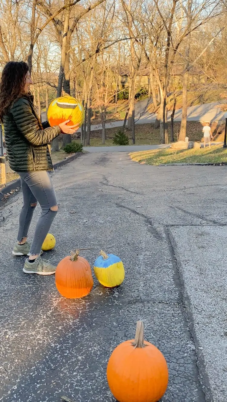 at home halloween tradition - pumpkin bowling