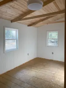 cedar plank ceiling progress at the family cabin