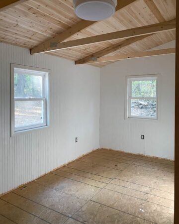 cedar plank ceiling progress at the family cabin