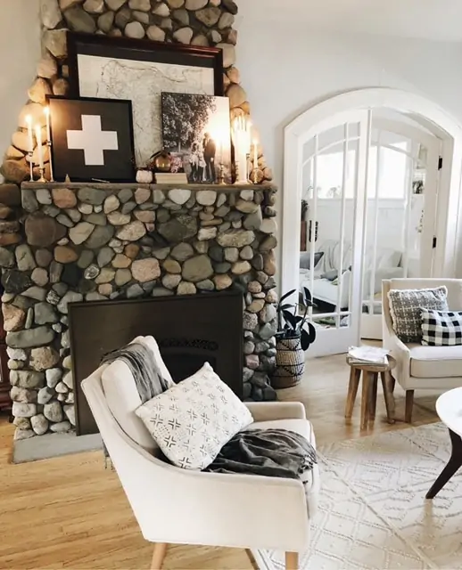 Spy the Fieldstone fireplace that is original to the home. 