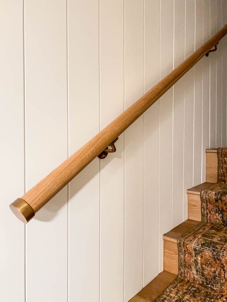 wood stair railing with decorative end caps
