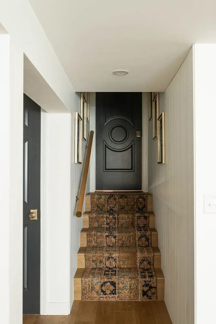 Luxury vinyl plank stairs in basement