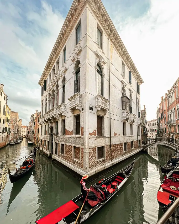 venice canal with gondolas 