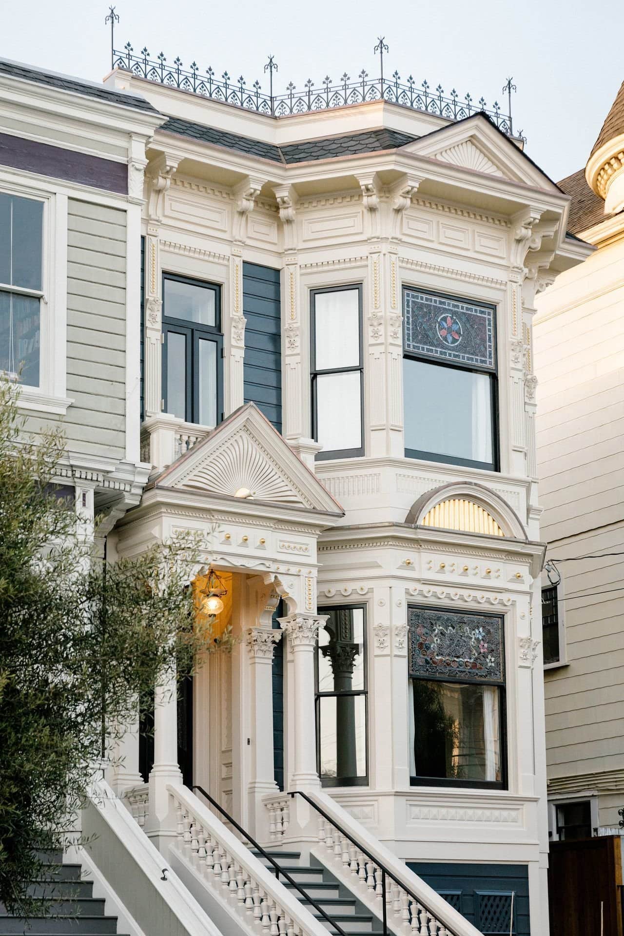VICTORIAN WHITE HOUSE WITH BLACK WINDOWS