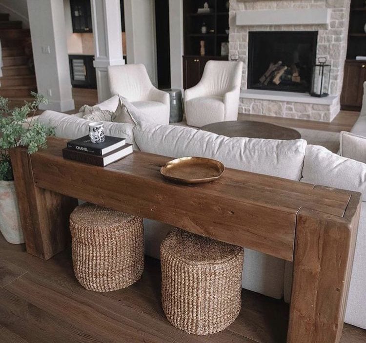 Skinny table behind couch 