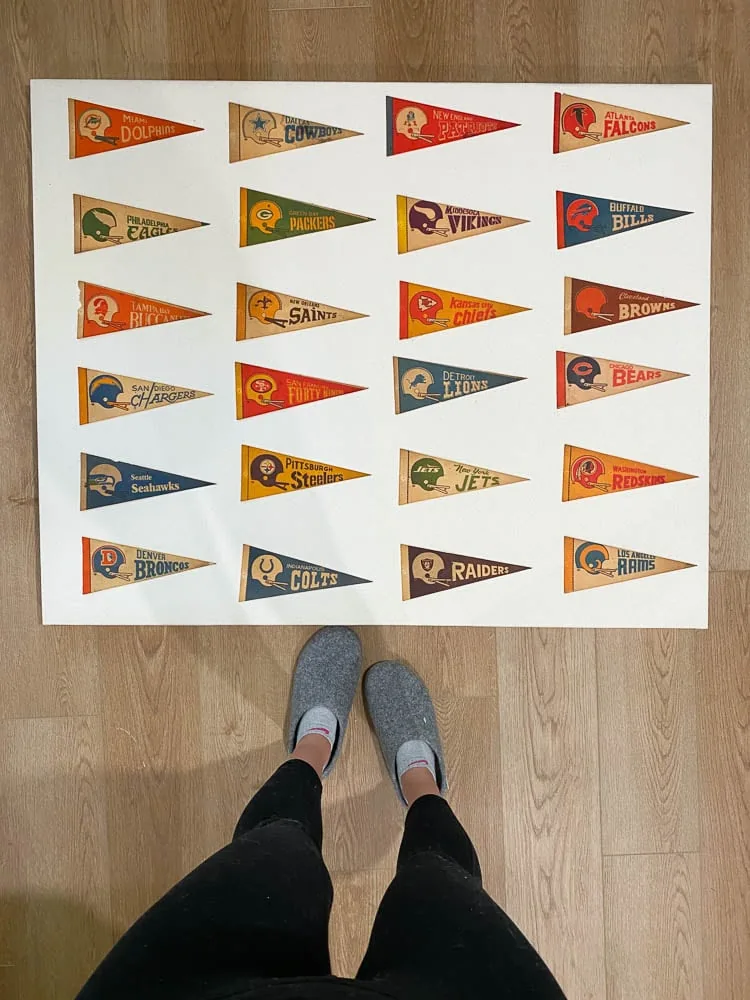 Testing vintage pennants placement on canvas