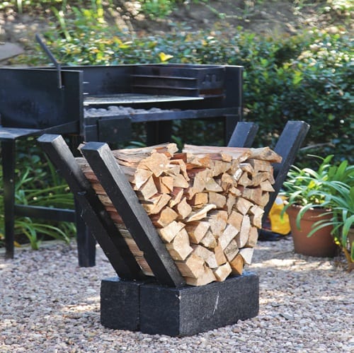 Firewood holder made out of cinder blocks and wood 