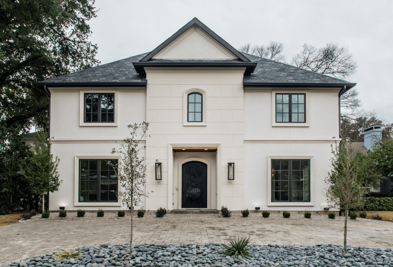 blue gray river rock in front of house