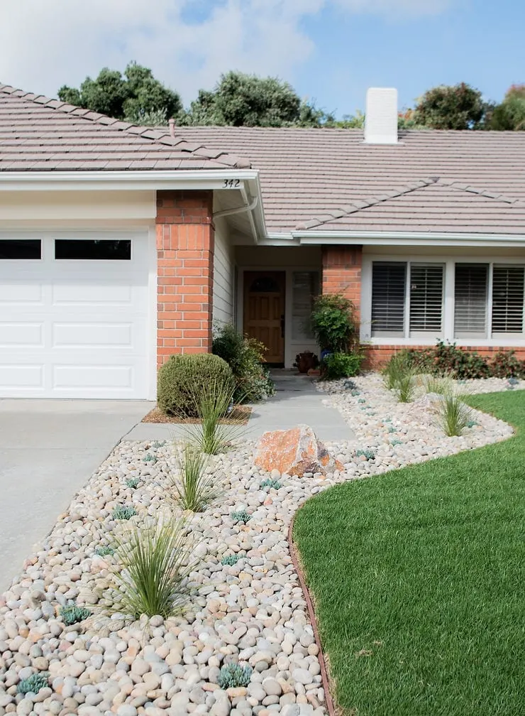 front house river rock landscaping