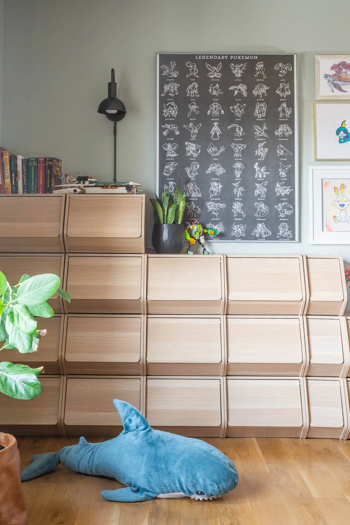 Lego storage and book storage in kid bedroom with blue gray paint 