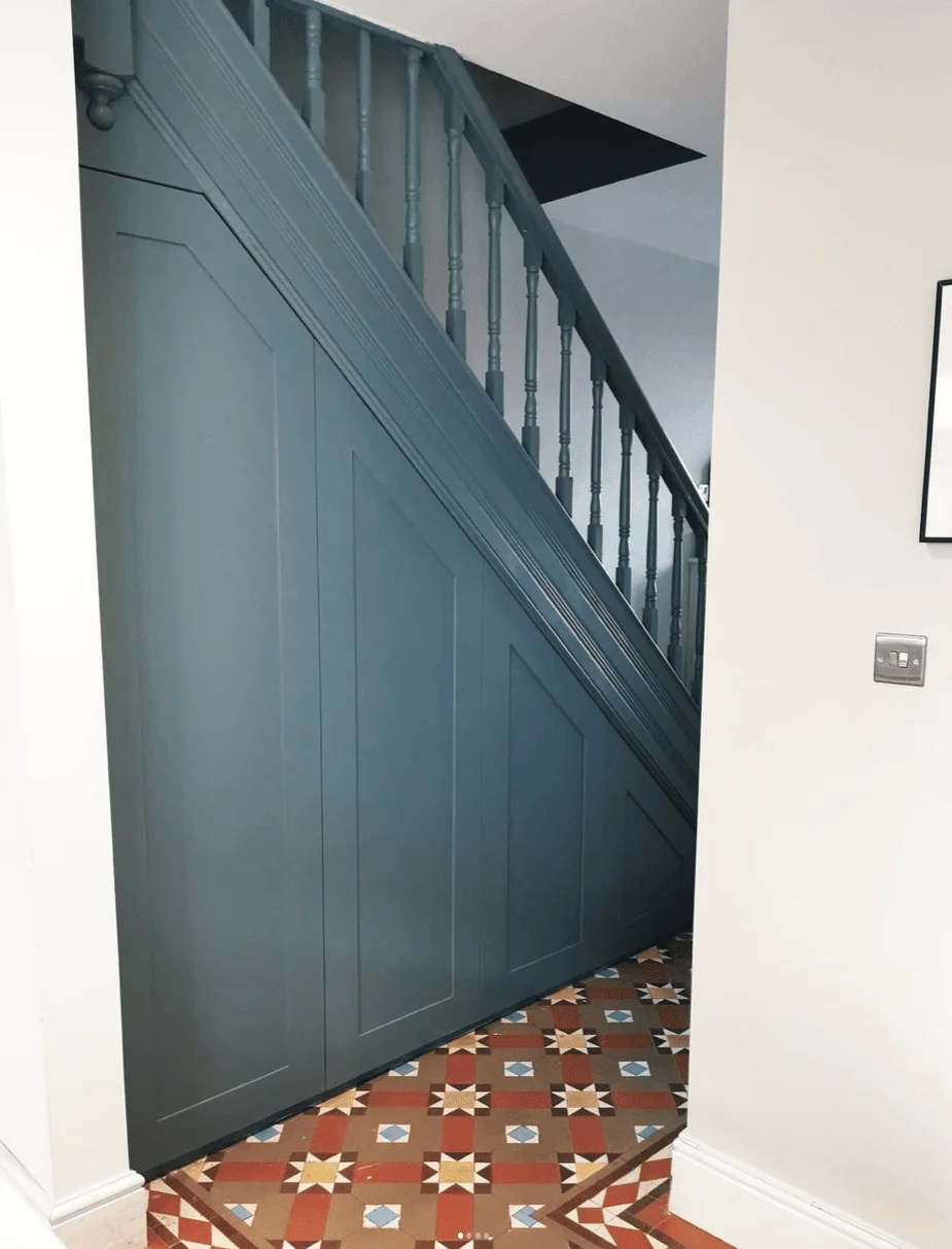 blue staircase with storage 