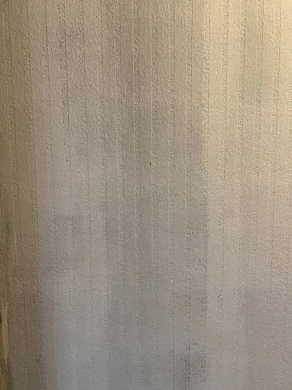 painting the topcoat on the stripes in the hallway makeover