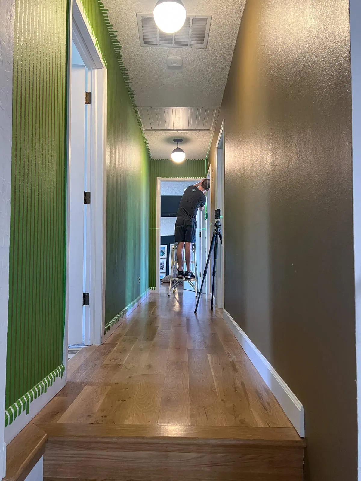 adding painters tape to hallway get get hallway stripes